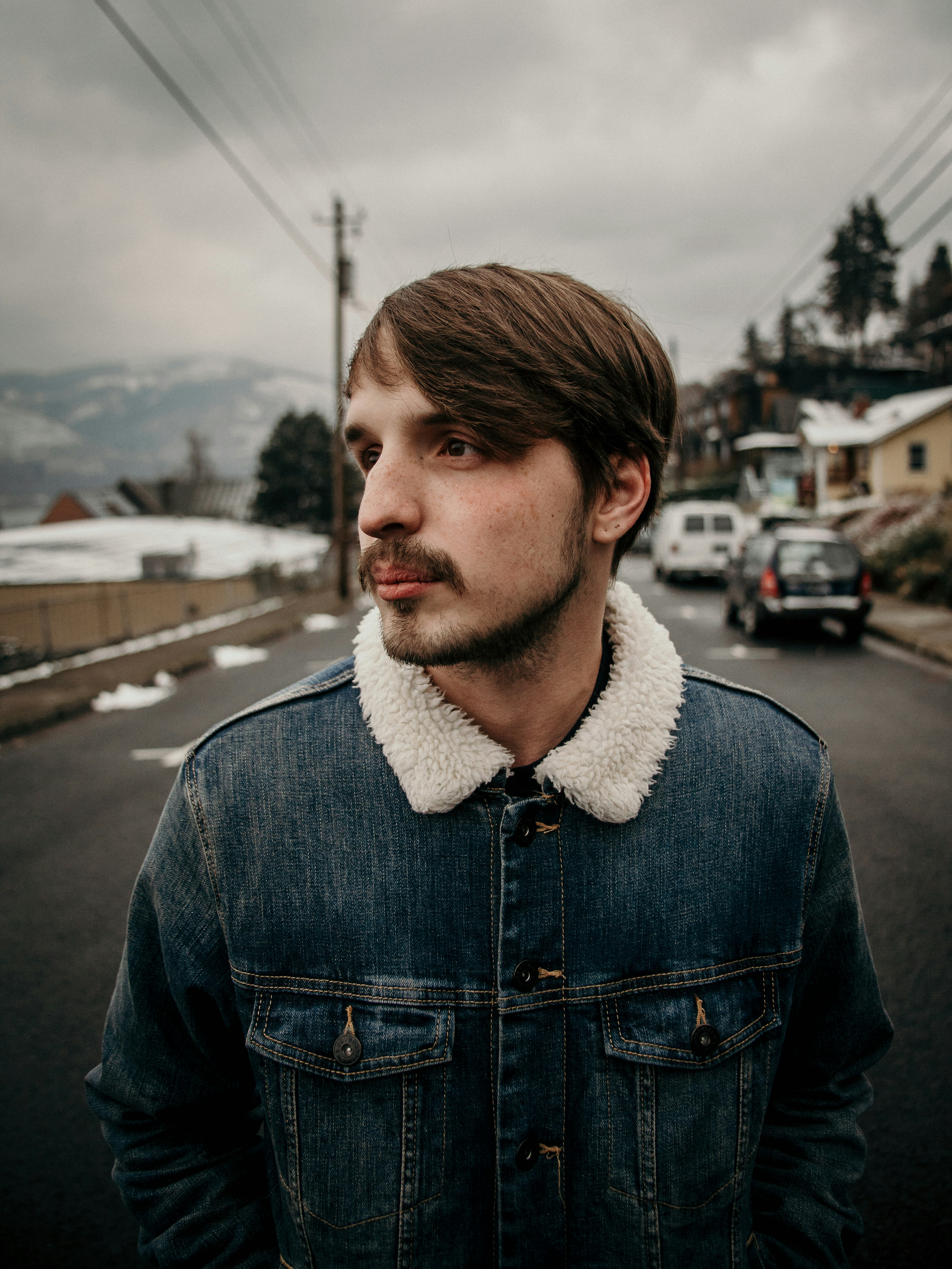 man standing in road